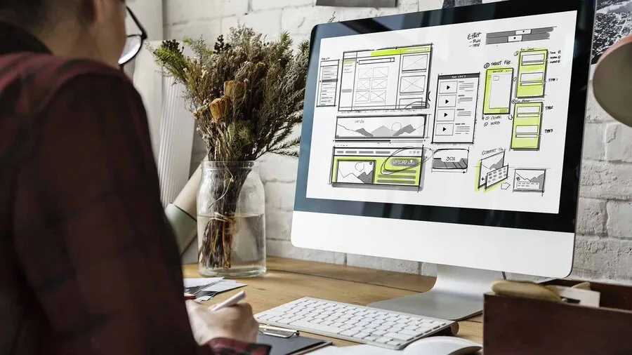 Key-Features-That-Make-Business-Websites-DifferenceWebsite-development-layout-sketch-drawing